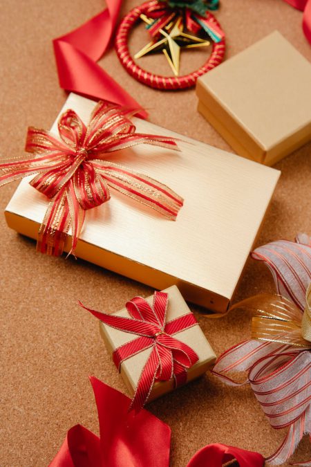 gift boxes with red ribbons