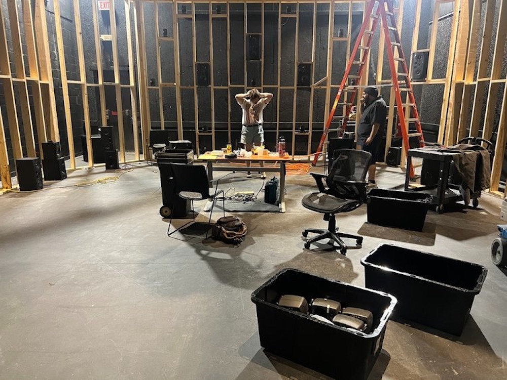 A room with construction scaffolding around all the walls.