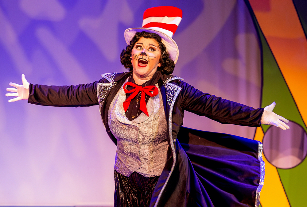 An actress playing the Cat in the Hat performs